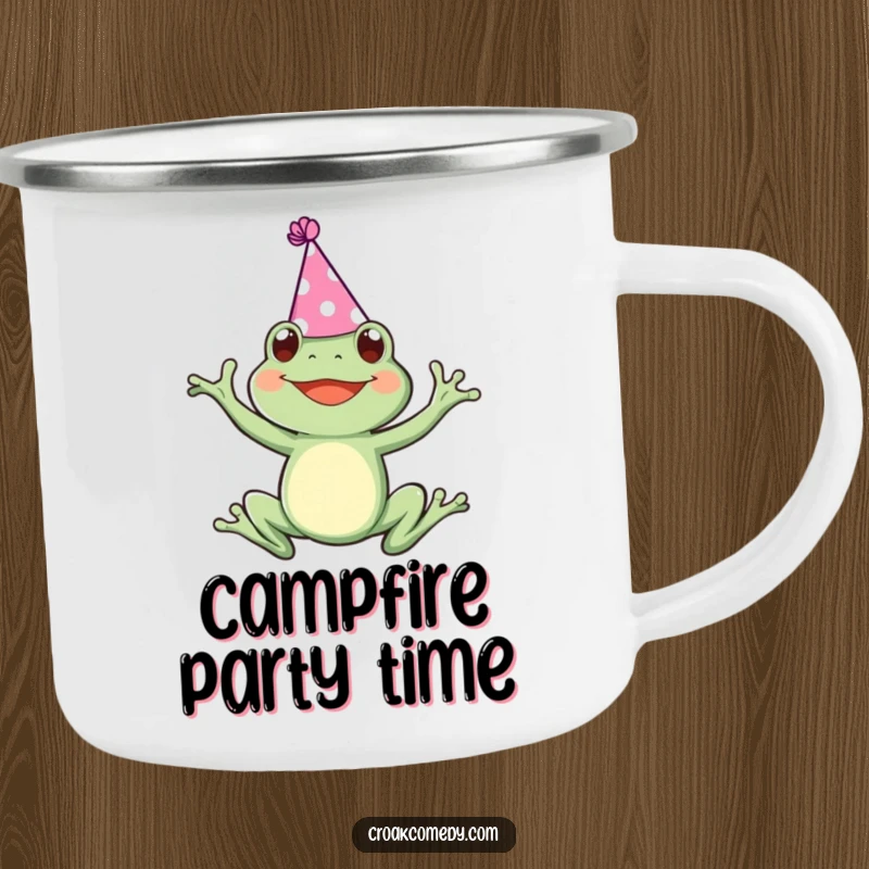 Funny enamel camping mug featuring a frog in a party hat, joyfully leaping, perfect for outdoor beverages and celebrations.
