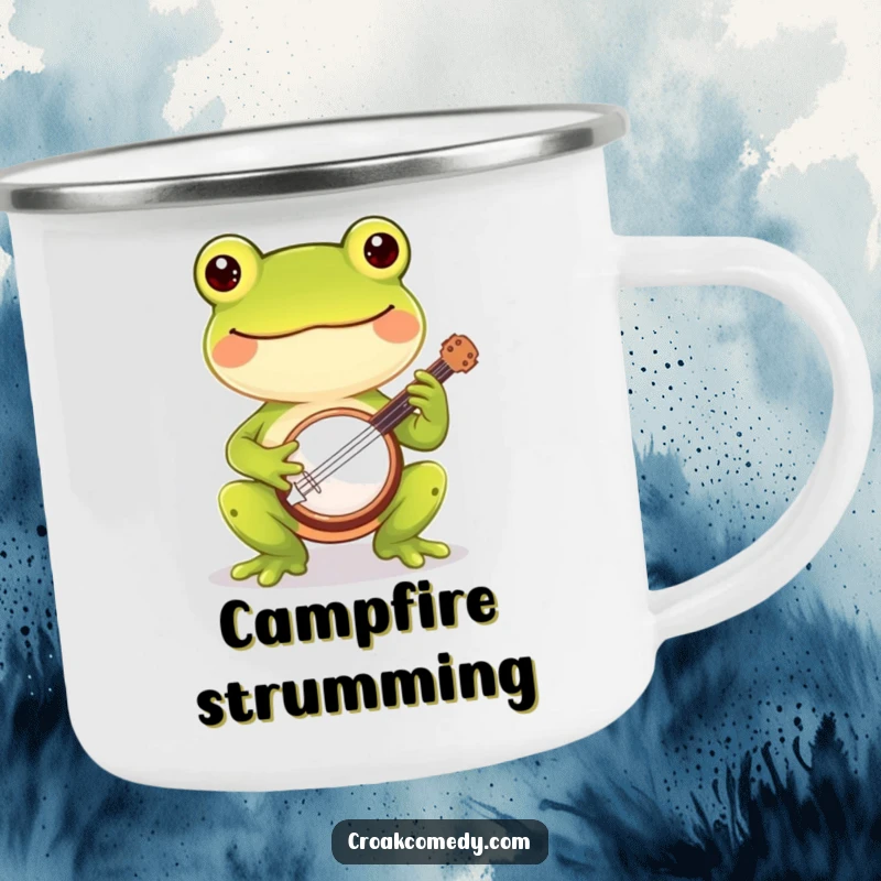 Funny frog camping mug featuring a cheerful frog playing a banjo, designed for outdoor musical humor.