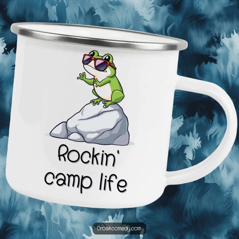 Funny frog wearing sunglasses, balancing on a rock, illustrated on this durable and humorous camping mug.