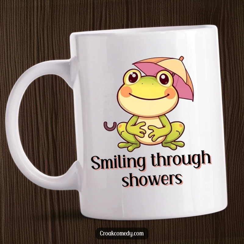 Funny cheerful frog with a wide smile, holding a tiny umbrella, on a mug, spreading joy and humor, great gift idea.