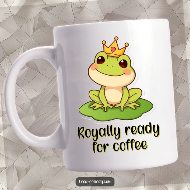 Funny mug depicting a happy frog wearing a tiny crown, sitting regally on a lily pad, embodying playful royalty.