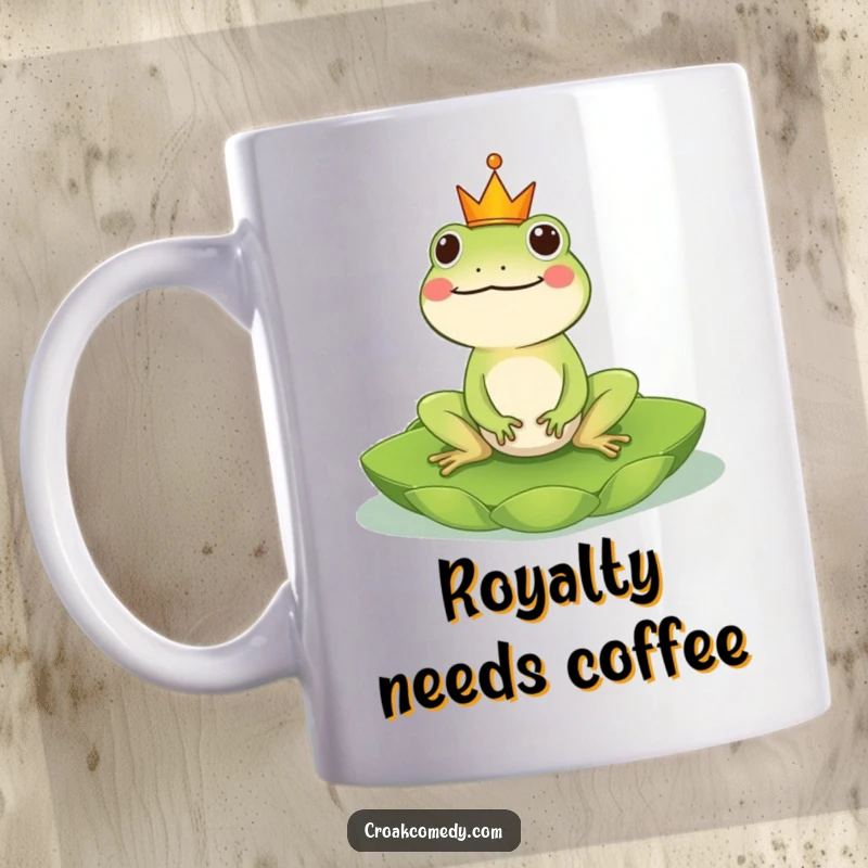 Funny Frog Mug: A cheerful, crowned frog proudly riding a lily pad, embodying regal humor, perfect for a funny gift.
