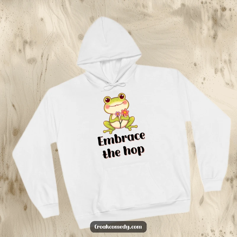 Funny Frog Hoodie depicting a cheerful frog holding a flower, legs spread wide in a happy display, ideal for cozy humor.
