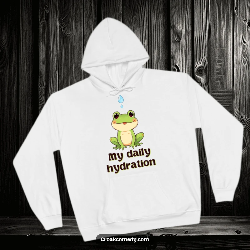 Funny hoodie depicting a happy frog catching a falling raindrop, designed for ultimate comfort and a touch of rainy day cheer.