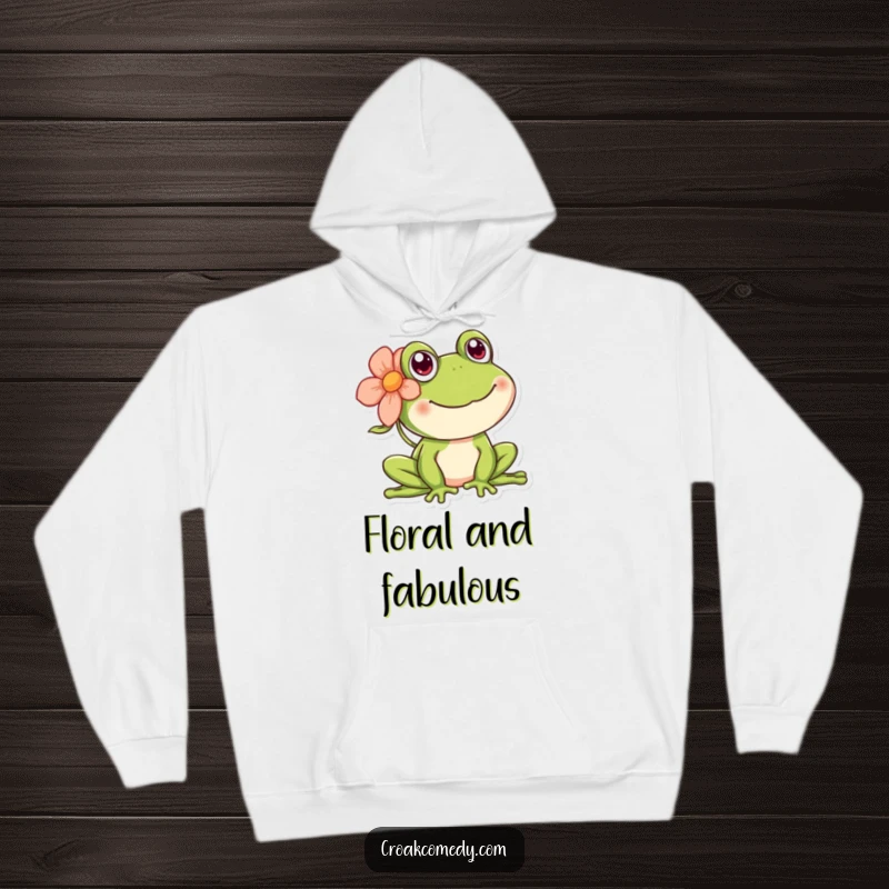 Funny happy frog hoodie, depicting a smiling amphibian adorned with a pretty flower behind its ear.