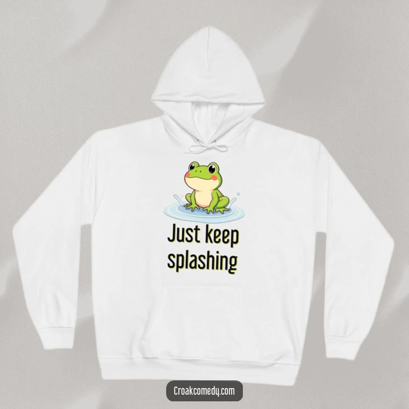 Funny frog in a cozy hoodie, splashing playfully in a puddle. A humorous and warm gift for frog enthusiasts.