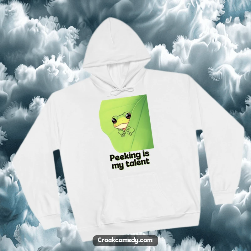 Funny frog peeking from behind a lush green leaf, offering a sense of mystery and humor on this cozy hoodie.