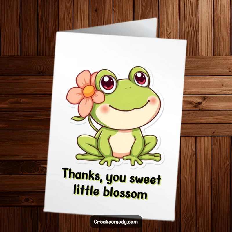 Funny Free Printable Thank You Card of a happy frog wearing a flower behind its ear, sending cheerful thanks.