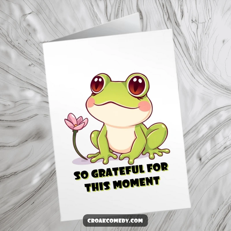Funny Free Printable Thank You Card of a frog with googly, crossed eyes gazing at a floating flower petal.