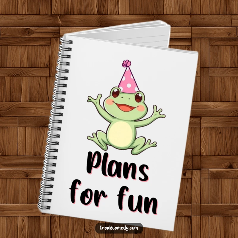 Funny notebook cover with a frog wearing a party hat, joyfully leaping, ideal for note-taking and planning celebrations.