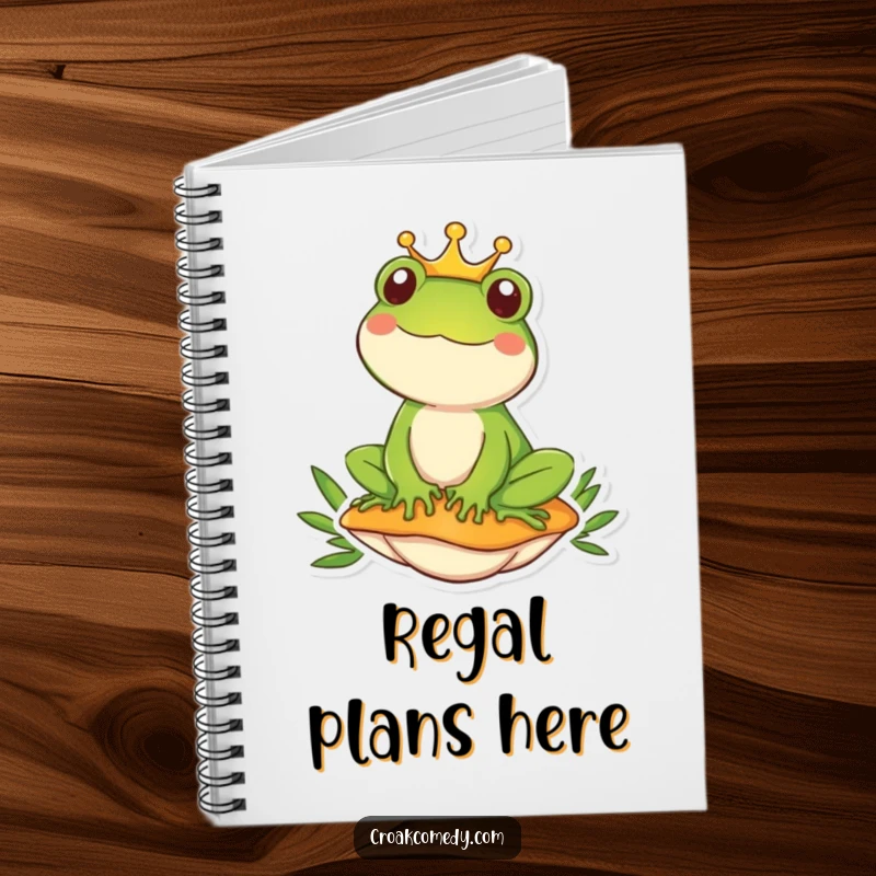 Funny frog wearing a crown sits regally on a mushroom, adorning a notebook for humorous note-taking.