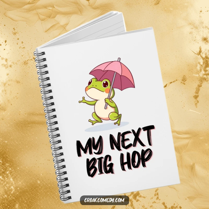 Funny frog character holding a small umbrella, gracing the cover of a notebook, ideal for whimsical note-taking.