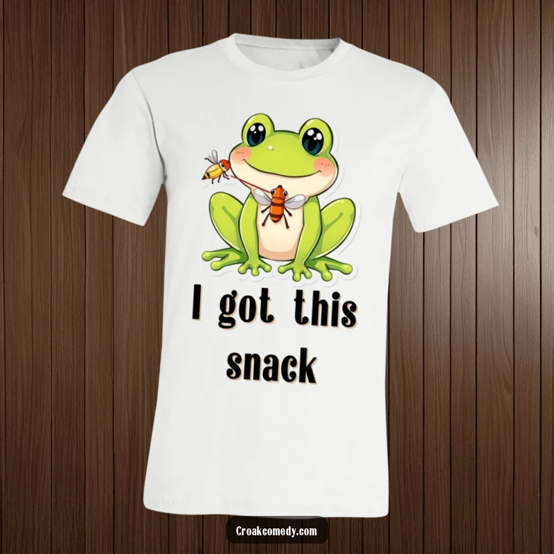 Funny T-Shirt: A smiling frog performing a comical trick, balancing a fly on its extended tongue, embodying playful mischief.