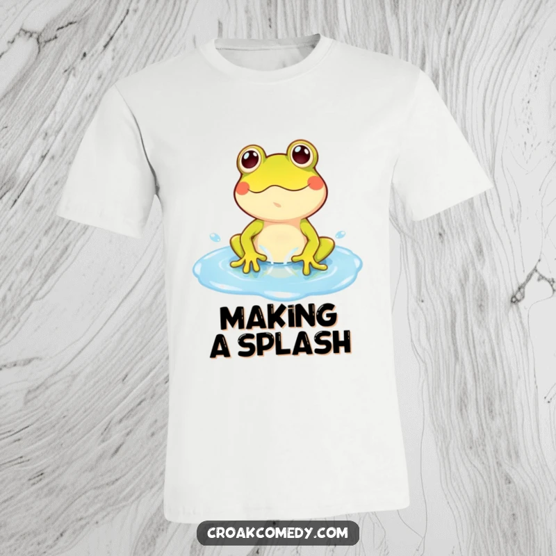 Funny Frog T-Shirt: A playful cartoon frog joyfully splashing in a bright blue puddle, embodying pure fun.