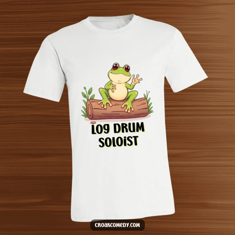 Funny t-shirt depicting a frog with comically large feet rhythmically tapping a log, creating a visual beat.