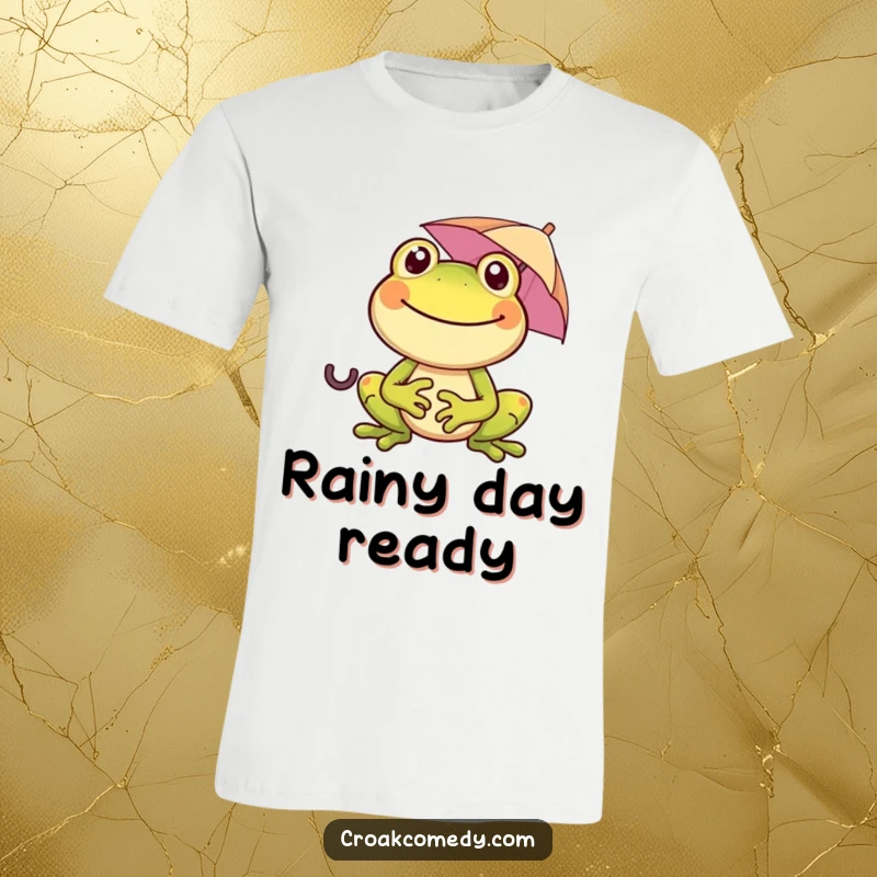 Funny frog with a wide smile, holding a tiny umbrella on a t-shirt, conveying happiness and humor for all to see.