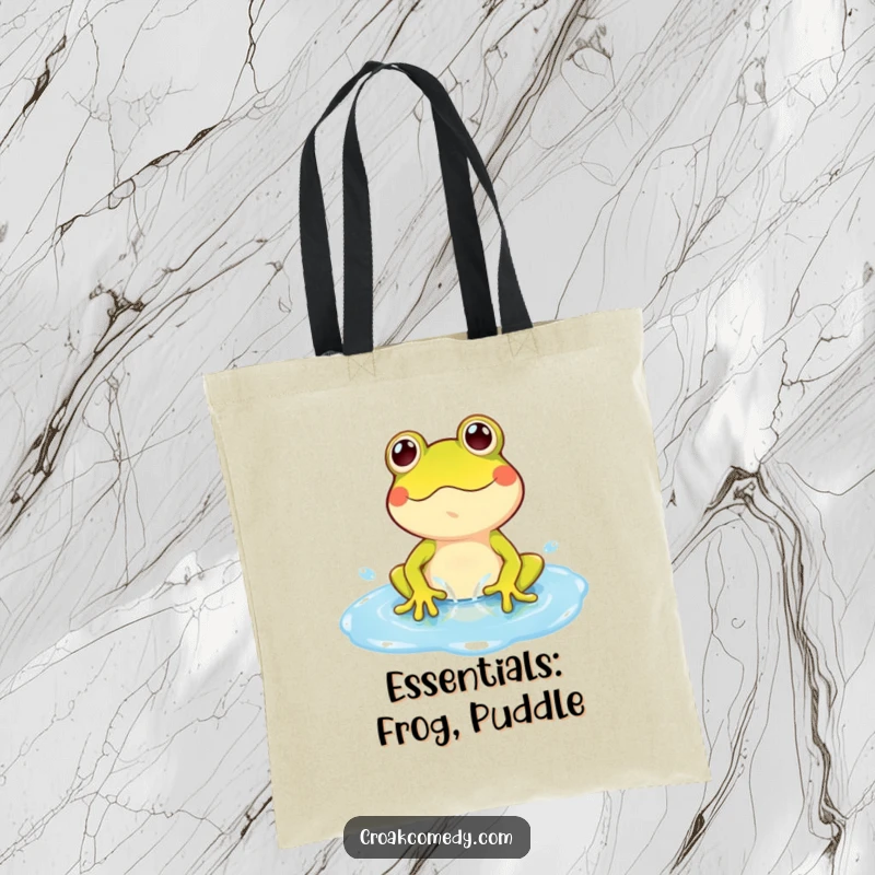 Funny Frog Tote Bag: A playful frog character happily splashing in a bright blue puddle, a fun and useful bag.